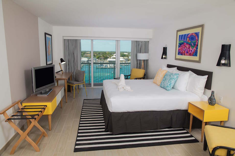 A Harbour Deluxe Balcony King room at the property.