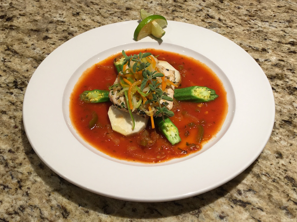 At Chef Oliver's cooking class, you can learn how to make dishes like this tuna glazed with Mount Gay Rum and local sweet potato and vegetables.