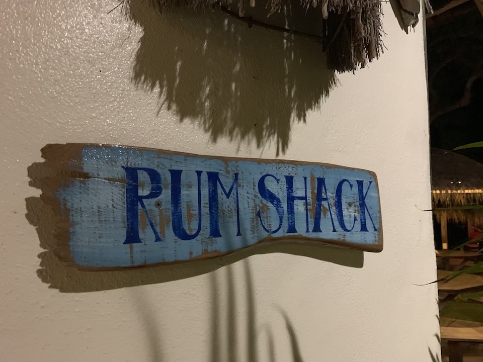 all-inclusive rum shack sign