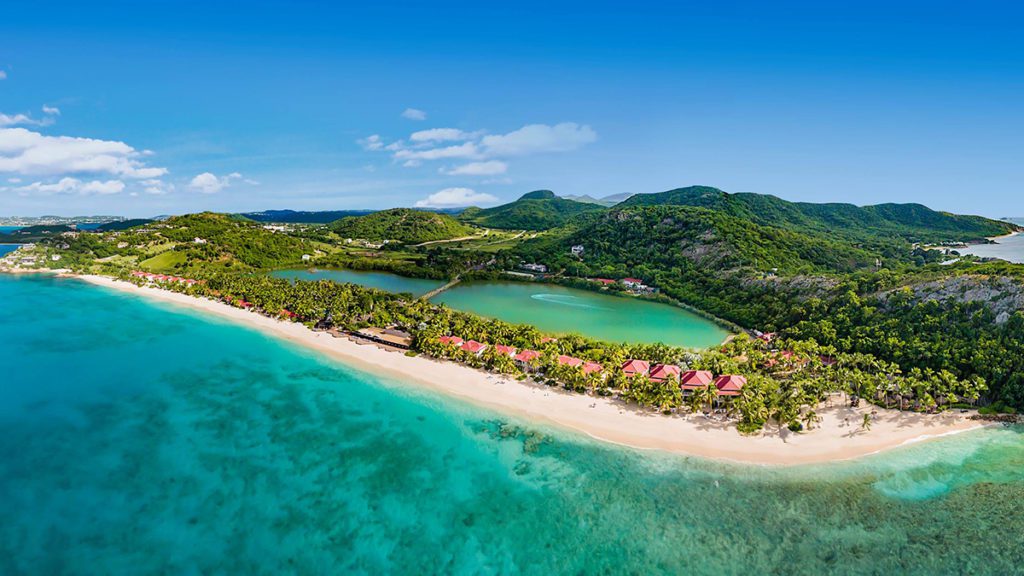 antigua barbuda frontier airlines the peninsula with sand