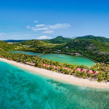 antigua barbuda frontier airlines the peninsula with sand