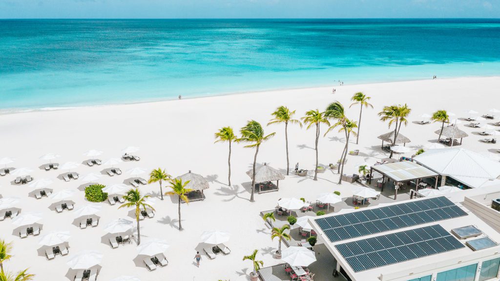 aruba bucuti tara resort beach with umbrellas