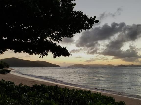 mahoe bay at sunset in the bvi