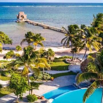 belize resort on the beach in front of the ocean