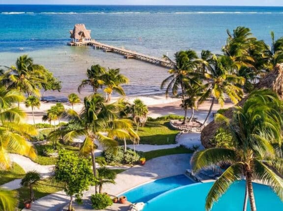 belize resort on the beach in front of the ocean