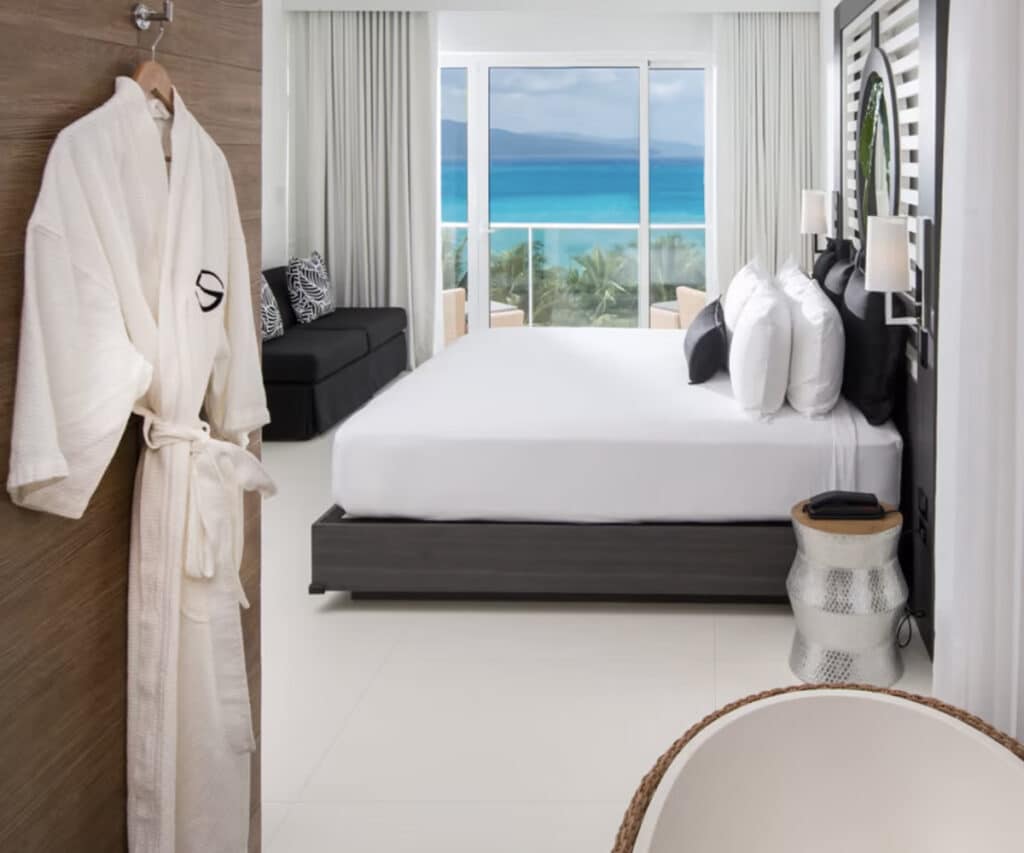 all-inclusive jamaica vacation, bedroom with robe 