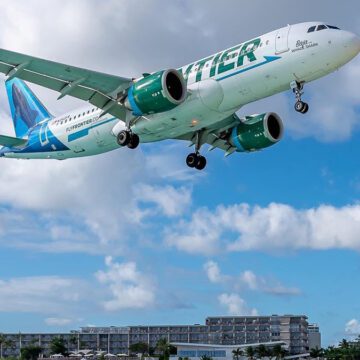 a plane landing on Simpson Bay