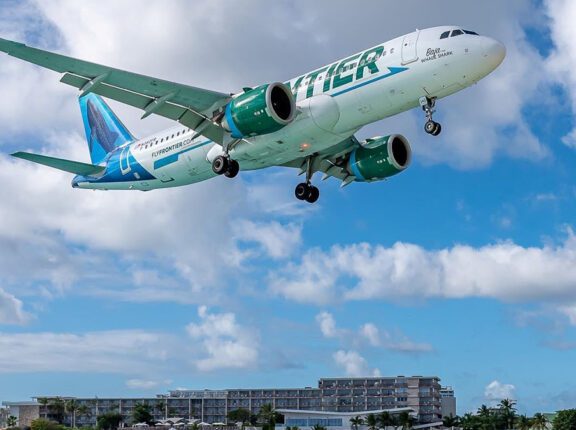 a plane landing on Simpson Bay