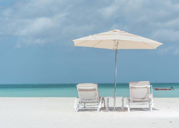 aruba ritz on the sand under umbrella