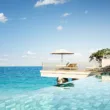 a plunge pool room at the six senses with view of ocean
