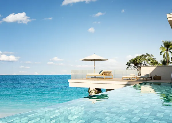 a plunge pool room at the six senses with view of ocean