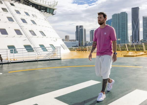 lionel messi walks on the ship deck