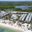 the beach with the resort in the background