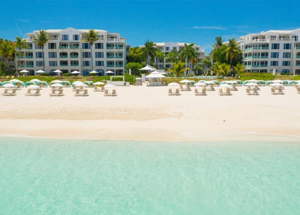 beach at palms resort with umbrellas