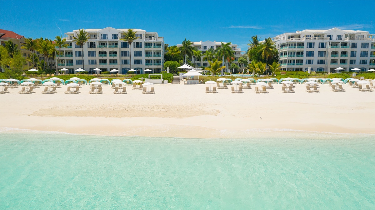 beach at palms resort with umbrellas