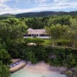 ian fleming villa with beach and green trees