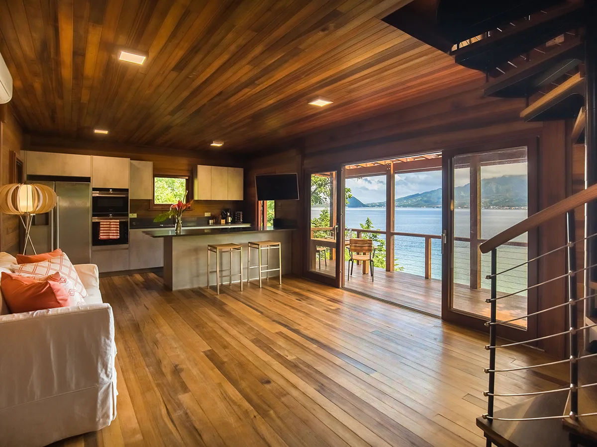 inside a villa with kitchen and wood floor