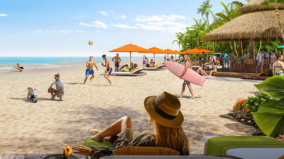 cozumel beach club with woman looking at umbrellas