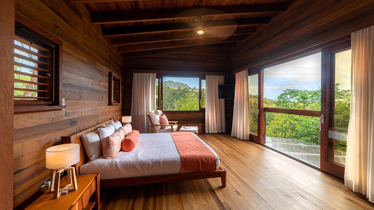 a bedroom with views of island