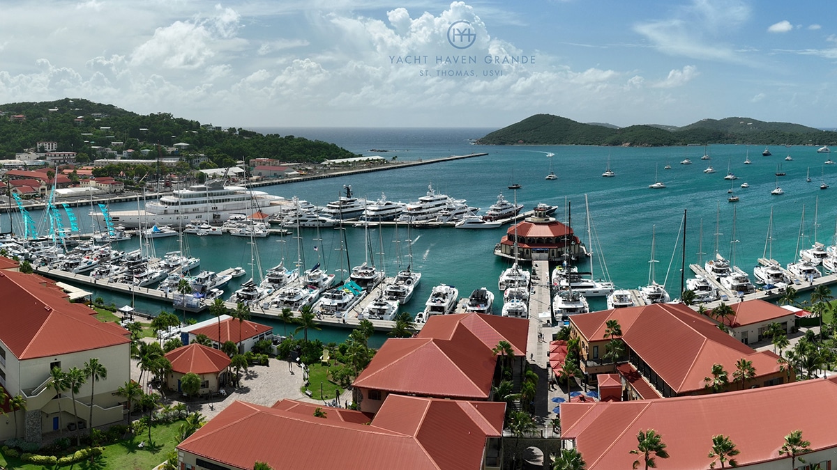 st thomas red roofs and water with green hills in background