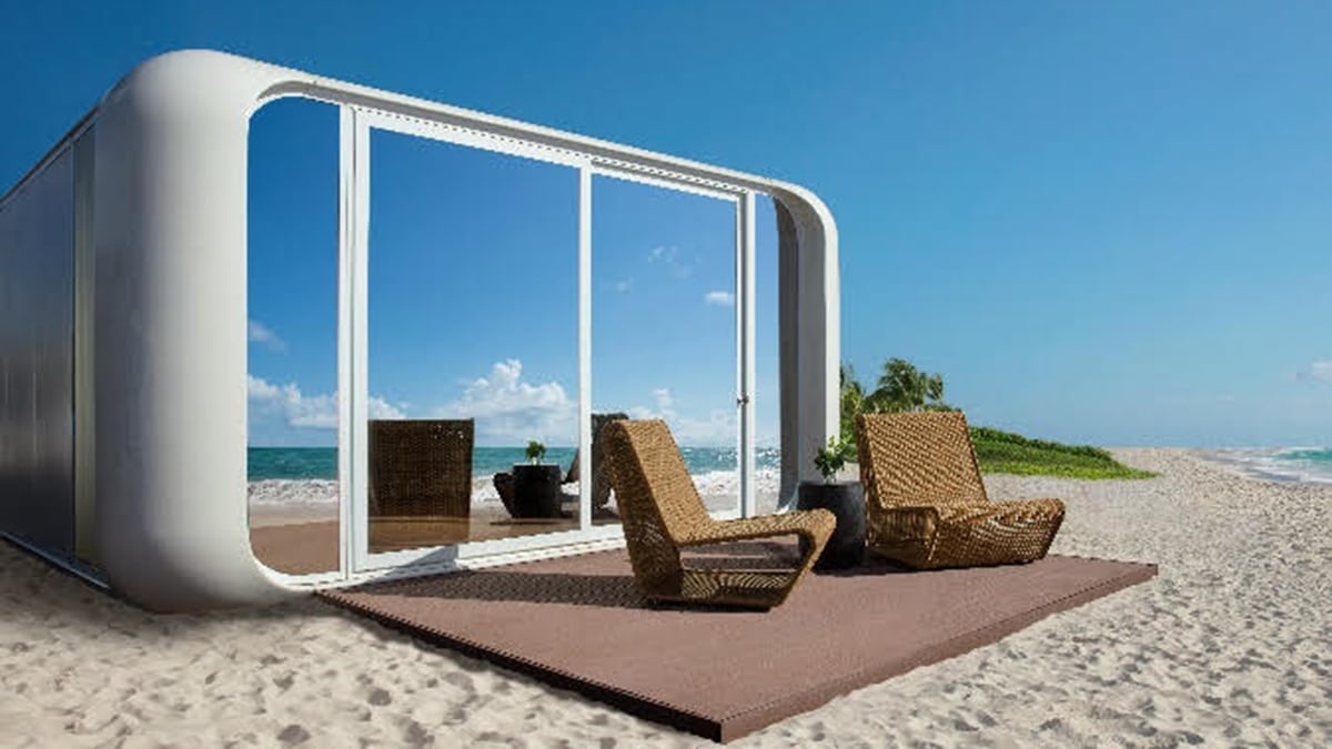 beach bungalow on the sand with reflection of water