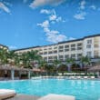 marriott cancun all-inclusive resort pool with building