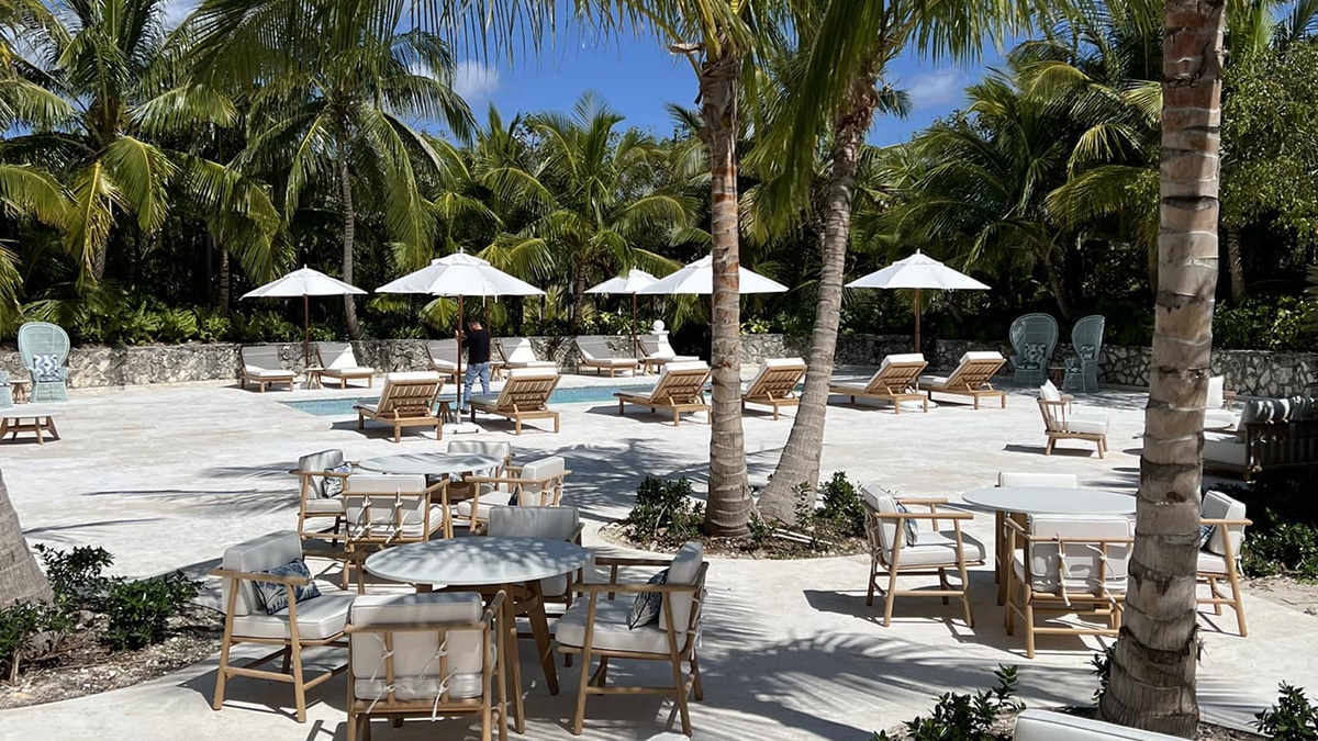 pool with umbrellas at eleuthera hotel