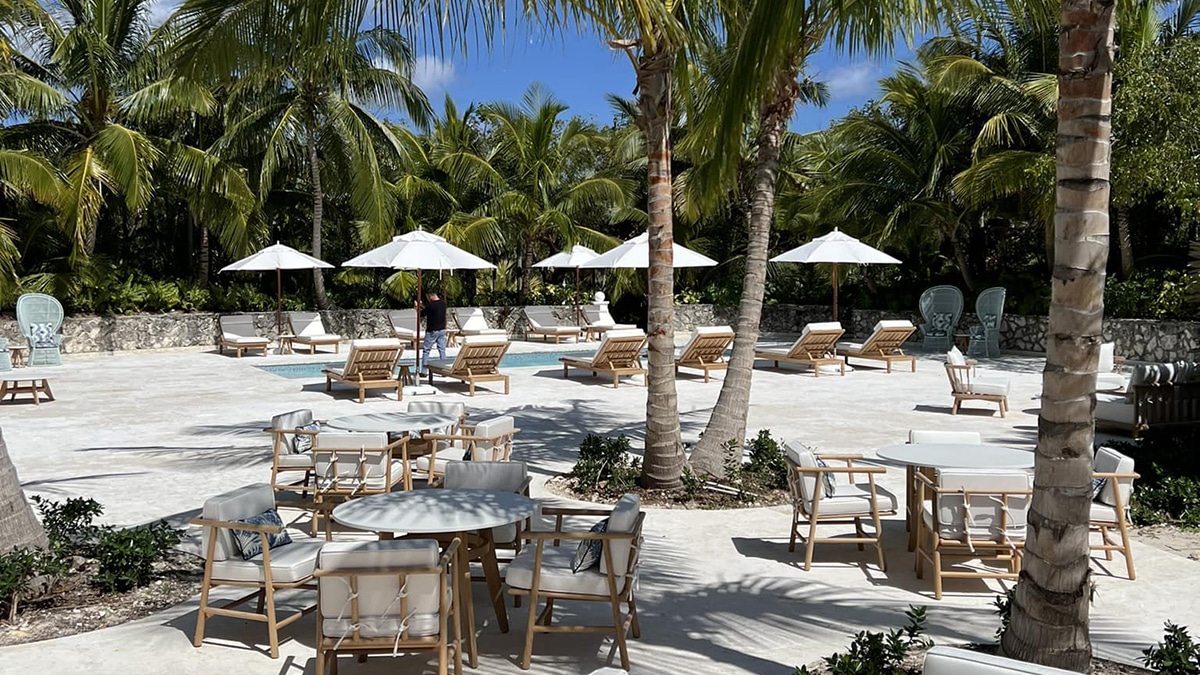 pool with umbrellas at eleuthera hotel