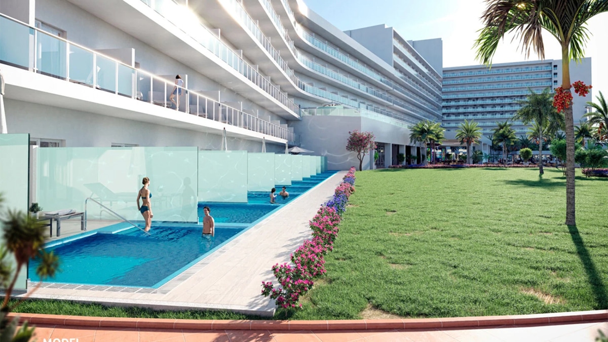 swim-up rooms with translucent walls and green lawn