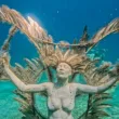 st maarten underwater sculpture of women with wings