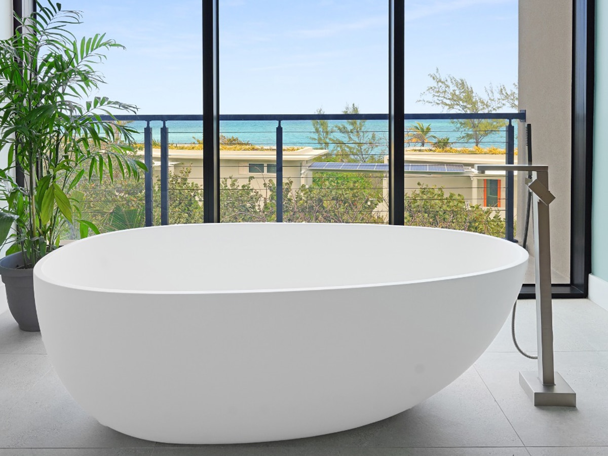 a bathtub with view of beach at vida