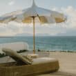 belmond spa on the beach with umbrella