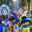 junkanoo dancers near staircase