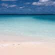 potlatch club pink sand with blue water