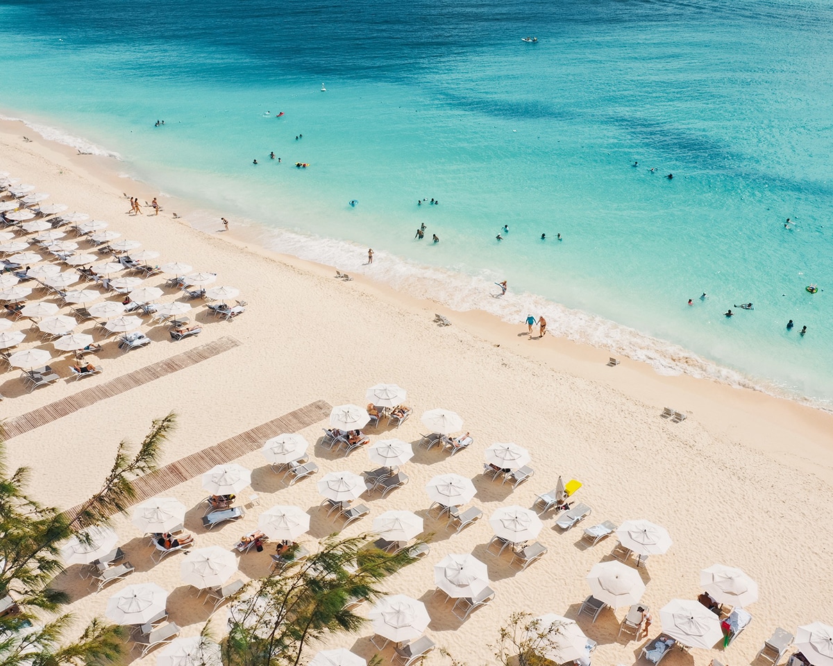 beach chairs on the sand in cayman