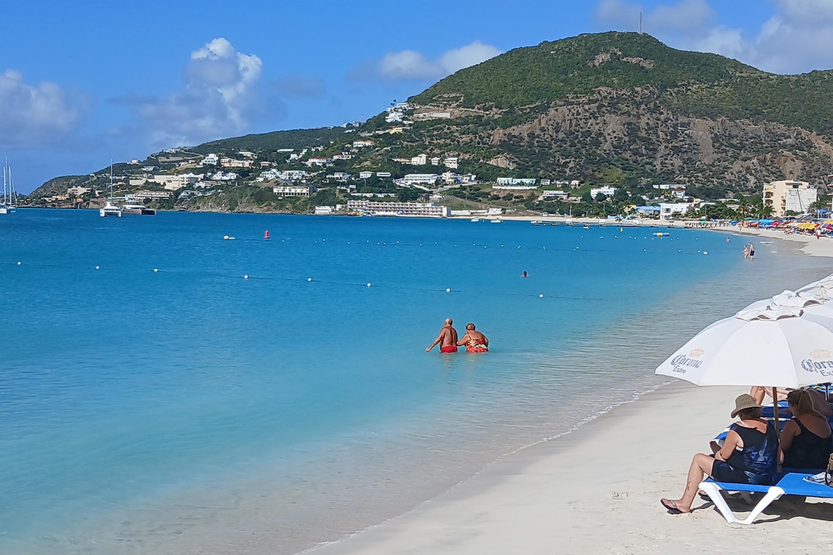 st maarten philipsburg couple in water next to sandy beach