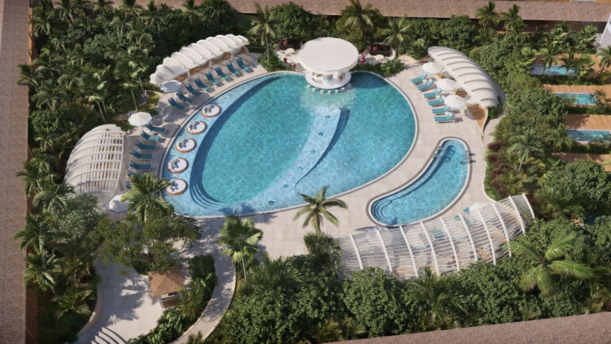 multiple pools at W Punta Cana surrounded by tropical scenery