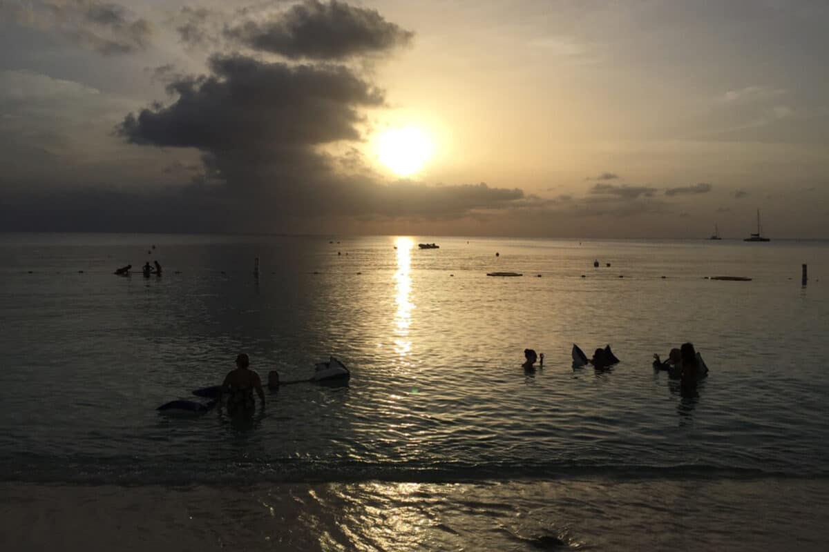sunset on seven mile beach in grand cayman