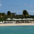caribbean island all-inclusive beach with umbrellas