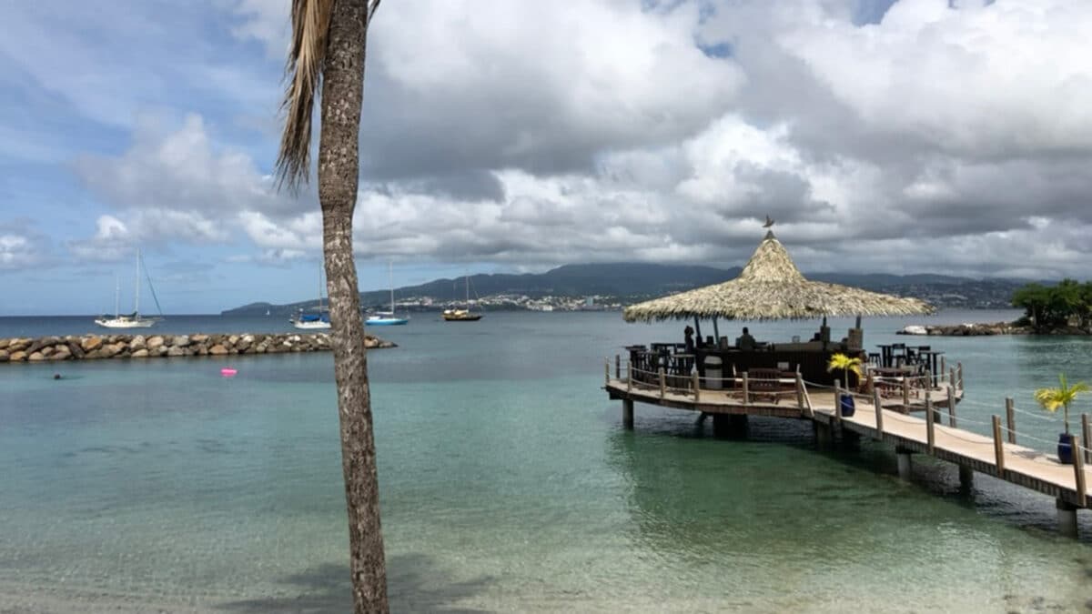 caribbean overwater bar with roof