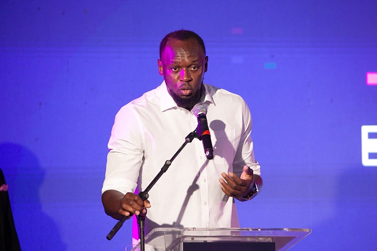 jamaica usain bolt speaking at announcement ceremony