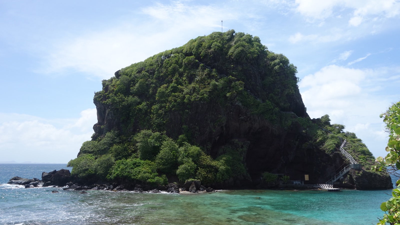This Overlooked Private Island Resort Is a Throwback to Another Era — and It Has a Floating Coconut Bar