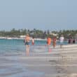 punta cana beach with tourists