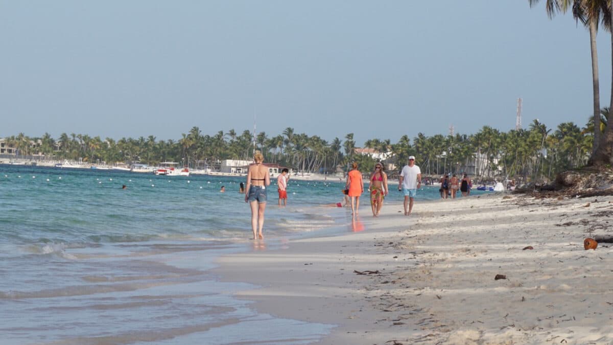 punta cana beach with tourists