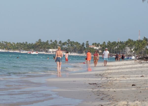 punta cana beach with tourists