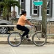 woman on bike in placencia