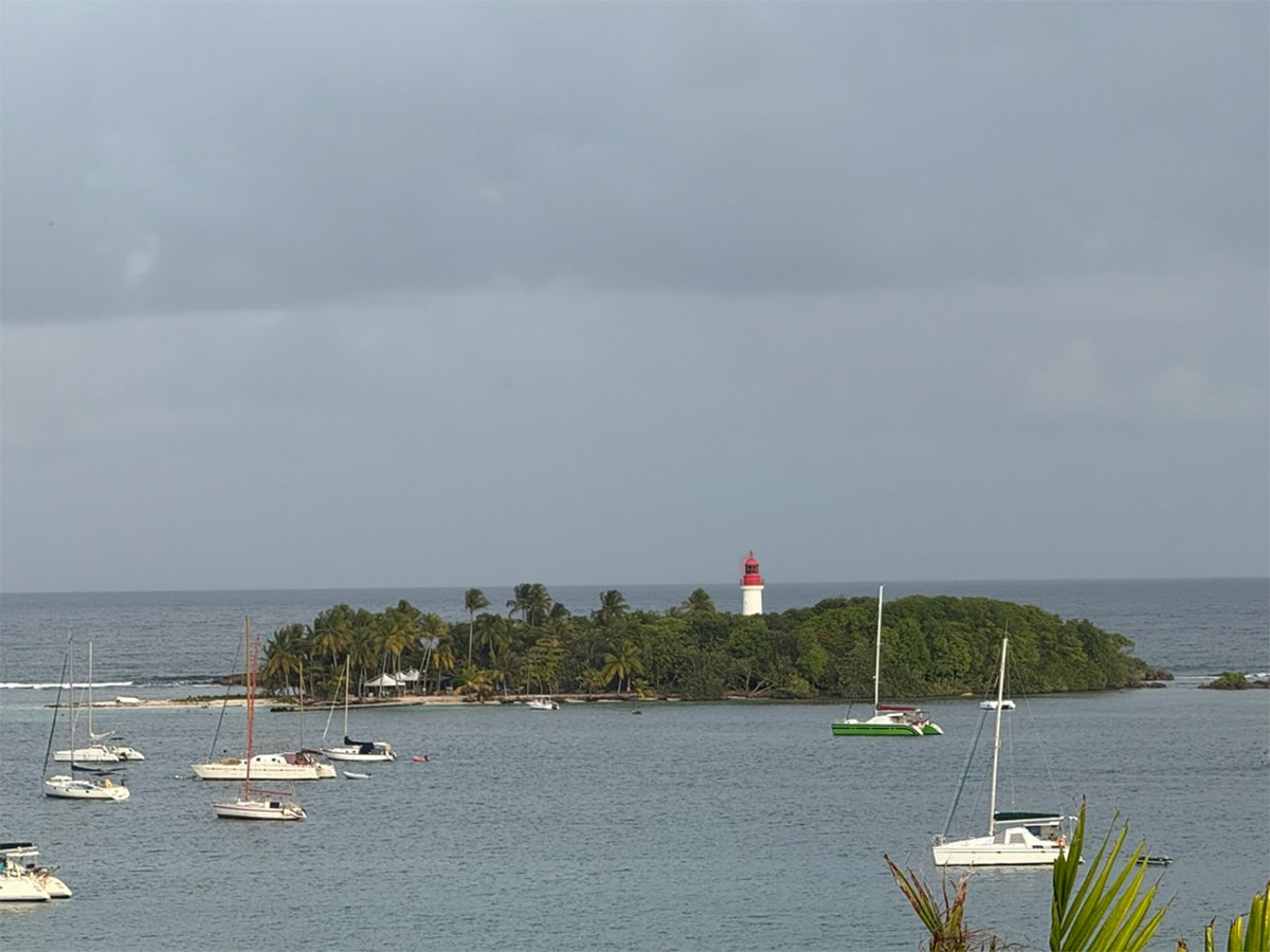 This Tiny Caribbean Islet Has a Lighthouse, a Postcard-Perfect Beach, and a Robinson Crusoe-Style Bar 