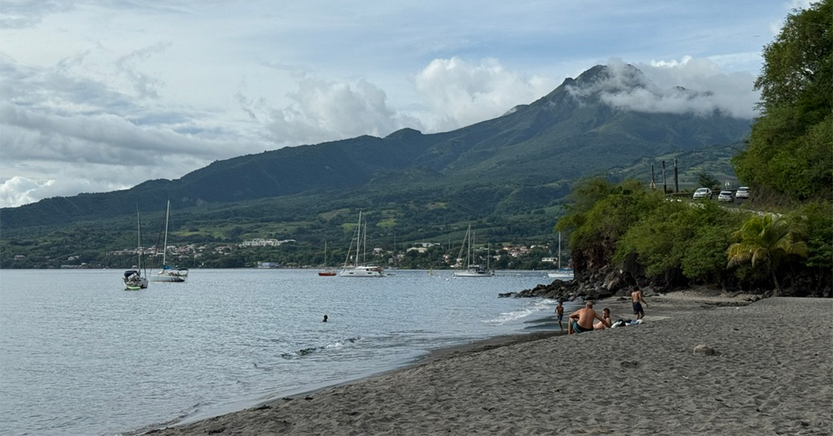 This Martinique Beach Has Black Sand, Crystal-Clear Water, and a Stunning Volcano View