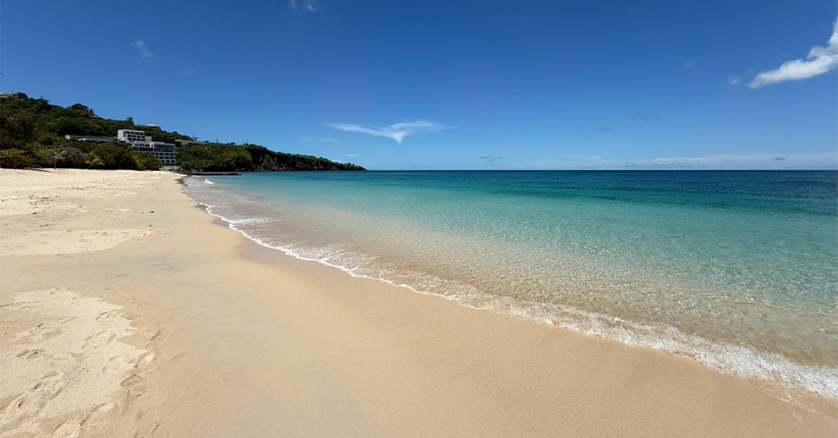 Why Travelers Love This Beach in Grenada, With Sugar-White Sand, Two Miles of Coastline, and a Town-Square Feeling