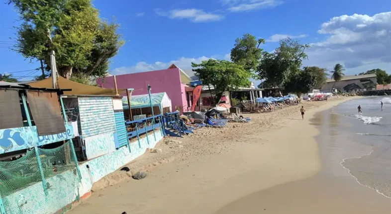 barbados beach in speightstown with people walking